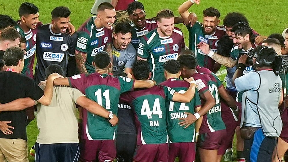 | Photo: PTI/Swapan Mahapatra : Mohun Bagan Super Giants players celebrate after winning the 2nd semifinal against Bengaluru FC